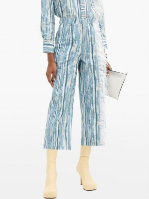 THEBE MAGUGU Feather-trimmed shredded denim-print cotton jeans - flipped