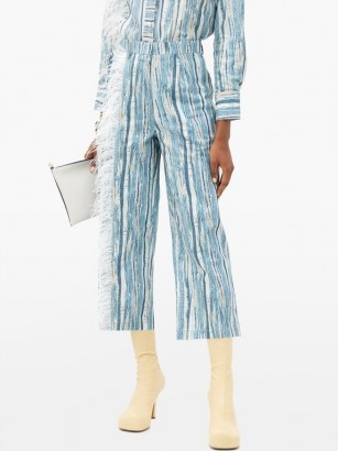 THEBE MAGUGU Feather-trimmed shredded denim-print cotton jeans