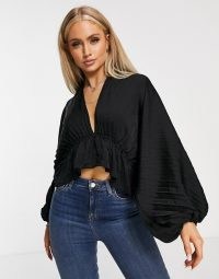 Free People Eloise top in black | deep V neck tops | volume sleeve blouse