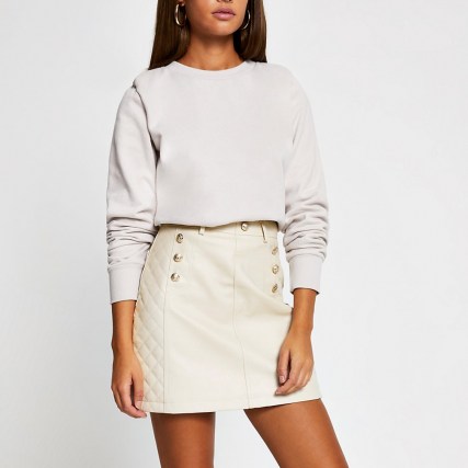River Island Stone PU quilted mini skirt – neutral button detail skirts – faux leather fabrics