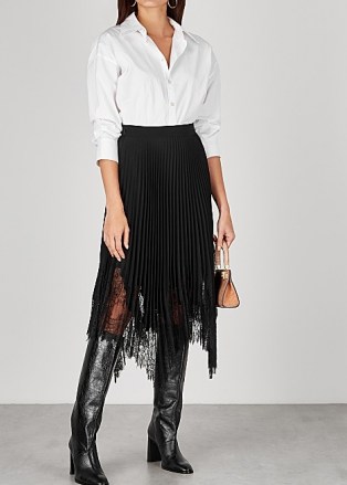 TORY BURCH Black lace-trimmed pleated midi skirt / feminine black semi sheer skirts / handkerchief hemline - flipped