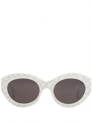 ALAÏA EYEWEAR Vienne oval acetate sunglasses / white studded eyewear / retro accessories - flipped