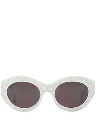 ALAÏA EYEWEAR Vienne oval acetate sunglasses / white studded eyewear / retro accessories