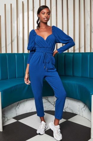 patricia bright puff sleeve jogger jumpsuit in blue / jumpsuits / celebrity fashion collarborations