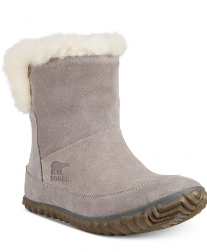 Sorel Women’s Out N About Bootie Slippers – plush faux fur in a cuffable design with outdoor-ready waterproof versatility.