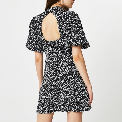 River Island Black puff sleeve floral print mini dress | cut out back volume sleeved dresses