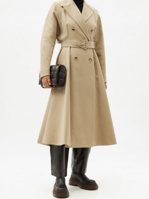 BOTTEGA VENETA Double-breasted water-repellent canvas trench coat | beige belted flared raincoat - flipped