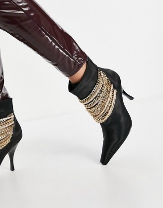 Jeffrey Campbell Chainge heeled ankle boots with chain details in black - flipped