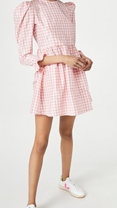 BATSHEVA Collarless Mini Prairie Dress is made from silk taffeta with a pink gingham check print and boasts puff shoulders, 3/4 length sleeves and ruffle detail cuffs.