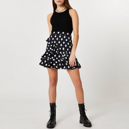River Island Black spot frill detail mini skirt | ruffled skirts - flipped