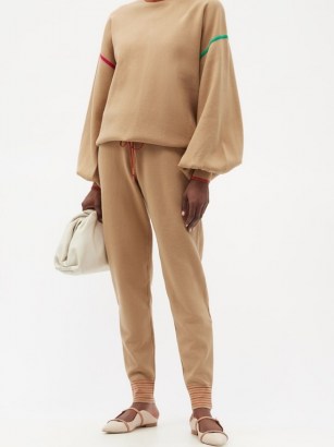 ROKSANDA Ponza drawstring-waist knitted track pants / beige soft knit joggers with a patch pocket detail and striped cuffs on the hem. Perfect for a sports luxe look.