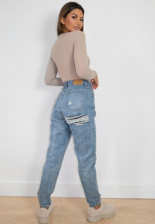sarah ashcroft x missguided blue bum slash riot mom jeans | ripped bum | rip detail denim