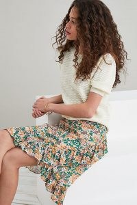 Kachel Sustainable Maria Wrap Mini Skirt | green floral ruffle trim summer skirts