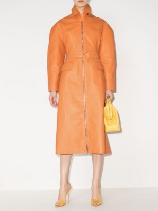 Bottega Veneta belted-waist leather trench coat / orange statement coats