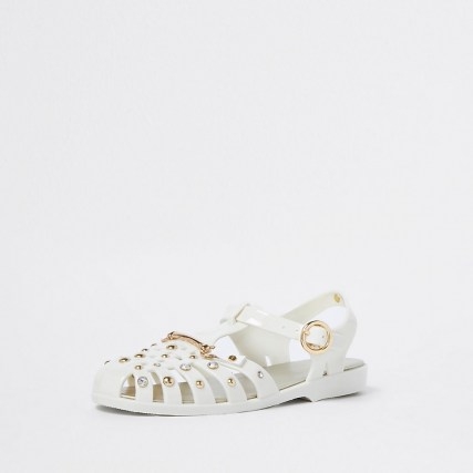 RIVER ISLAND Cream fisherman jelly sandals / caged PVC stud and gem embellished ankle strap flats - flipped
