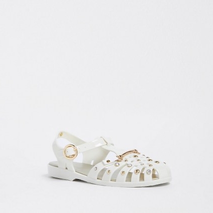 RIVER ISLAND Cream fisherman jelly sandals / caged PVC stud and gem embellished ankle strap flats