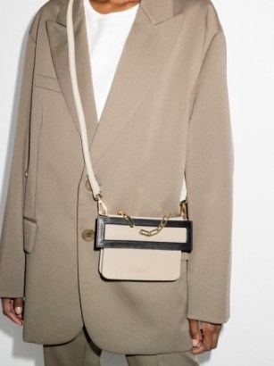 The Sant Himitsu leather shoulder bag | chic crossbody bags | small contemporary handbag - flipped