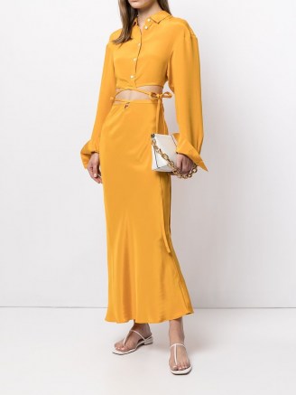 Christopher Esber cut-out tie skirt in mango yellow | fluid silk skirts