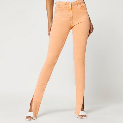 River Island Peach slim high rise split hem jeans | responsibly sourced cotton stretch denim | slit hems - flipped