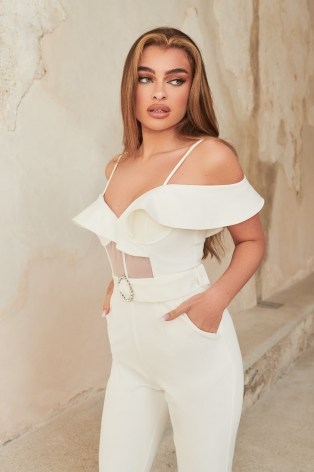 lavish alice ruffle off shoulder sheer corset jumpsuit in white – cold shoulder spaghetti strap jumpsuits - flipped
