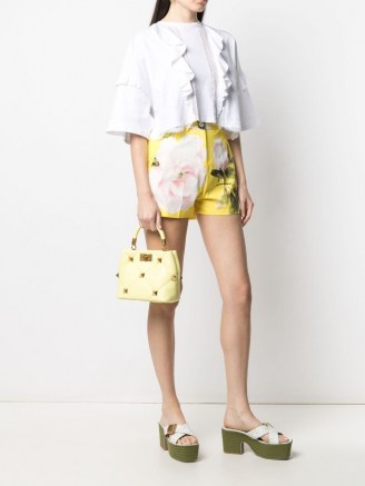 Valentino Garavani small Roman Stud top handle bag in pale lime yellow | small luxe studded handbag