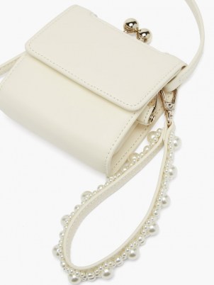 SIMONE ROCHA Faux pearl-embellished wristlet-strap leather bag ~ small white luxe bags ~ mini handbags