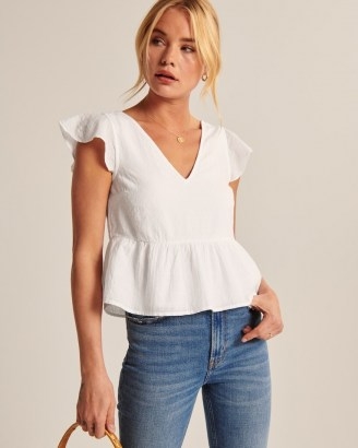 Abercrombie & Fitch Flutter Sleeve Trapeze Top | comfortable short-sleeve top in a soft linen-blend fabric and trapeze silhouette with on-trend flutter sleeves - flipped