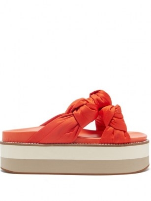 GANNI Orange knotted recycled-satin flatform slides | bright and chunky knot front sliders | vibrant summer flatforms - flipped