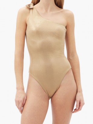SARA CRISTINA Nerea knotted one-shoulder swimsuit / metallic-gold asymmetric stretch jersey swimsuits - flipped