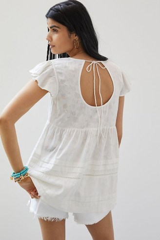 Maeve Textured Open-Back Tunic Blouse | womens white V-neck blouses | Anthropologie summer clothing | women’s flutter sleeve tops