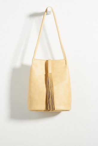 ANTHROPOLOGIE Tasseled Bucket Bag / womens stylish accessories / fringed detail shoulder bags - flipped