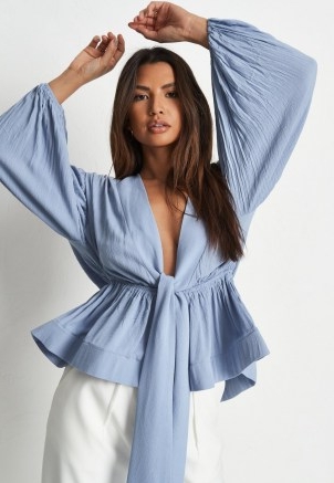 Missguided blue cheesecloth plunge flippy hem blouse | plunging tie front blouses
