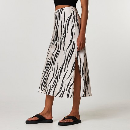 River Island Cream zebra bias midi skirt | split hem animal print skirts | womens trending fashion - flipped