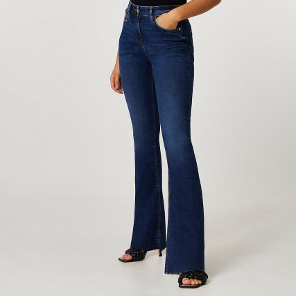 RIVER ISLAND Dark blue mid rise flare jeans | women’s denim flares - flipped