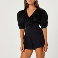 River Island Black frill v-neck puff sleeve playsuit | ruffled playsuits