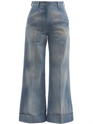 GUCCI High-rise wide-leg turn up cuff jeans | womens 70s inspired blue faded-wash trousers | women’s 1970s style casual fashion
