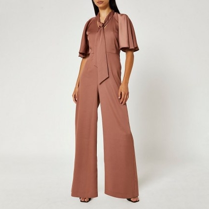 RIVER ISLAND Brown pussybow flute sleeve wide leg jumpsuit ~ neck tie angel sleeved jumpsuits