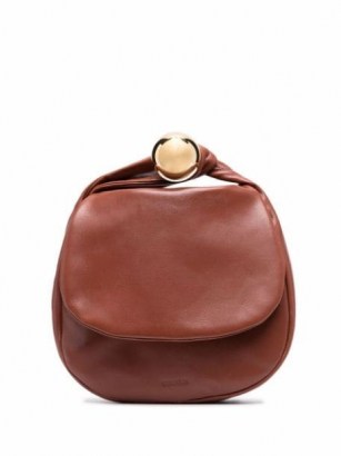 Jil Sander twist-handle tote bag in luggage brown ~ chic handbags ~ stylish leather flap front bags - flipped
