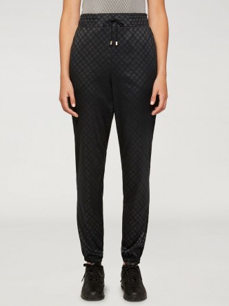 Wolford JYN TROUSERS Black / womens checked joggers / cuffed jogging bottoms / women’s sports fashion - flipped
