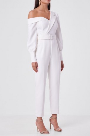LAVISH ALICE tailored off shoulder jumpsuit in white – chic one shoulder belted waist jumpsuits – going out evening fashion - flipped