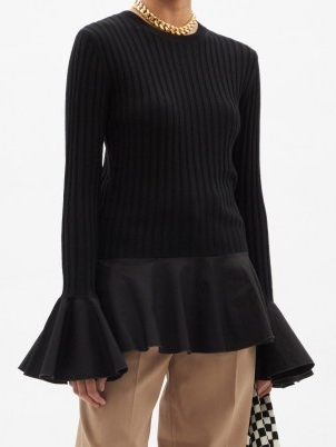 JW ANDERSON Fluted ribbed-knit wool-blend sweater in black | peplum hem sweaters | womens chic knitwear | feminine jumpers