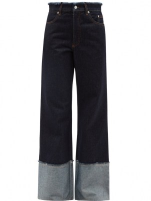 JW ANDERSON Logo-embroidered raw-edge wide-leg jeans | womens dark blue denim | women’s deep turn-up hem jeans - flipped