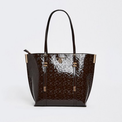 RIVER ISLAND Brown RI monogram embossed shopper bag ~ shiny patent shoppers ~ logo shoulder bags - flipped