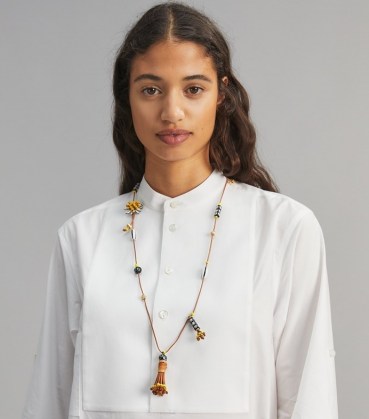 TORY BURCH CHARM LONG NECKLACE – modern bohemian jewellery – longline tasseled boho necklaces with charms - flipped