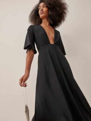 Reformation Ernest Dress in Black | deep plunge front LBD | plunging neckline fashion | feminine flared sleeves