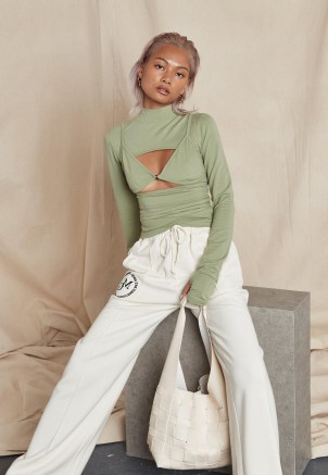 MISSGUIDED khaki cut out bralet overlay top – green long sleeve high neck tops - flipped