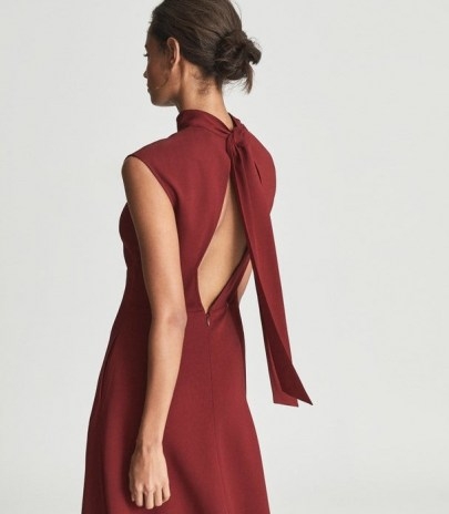 REISS LIVVY OPEN BACK MIDI DRESS DARK RED ~ chic high neck cap sleeve fit and flare dresses ~ womens self-tie bow detail occasion fashion - flipped