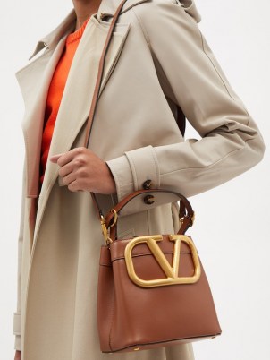 VALENTINO GARAVANI Supervee tan leather bucket bag | women’s designer logo shoulder bags | womens brown top handle handbags | chic accessories