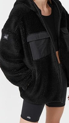 Alo Yoga Cargo Sherpa Jacket in Black – textured sports style jackets - flipped