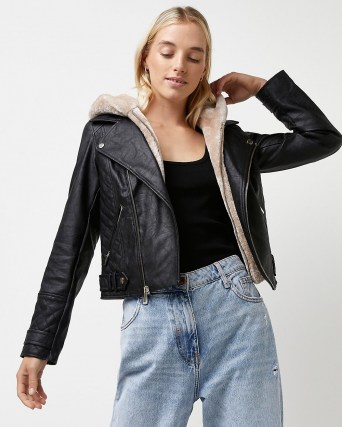 Black faux leather hooded biker jacket – casual faux fur lined jackets – womens modern classic outerwear - flipped